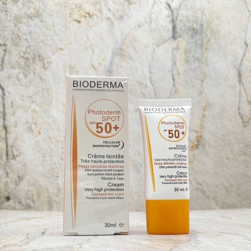 کرم-ضد-آفتاب-بی-رنگ-بایودرما-SPF-50-PHOTODERM-SPOT کرم ضد آفتاب بی رنگ بایودرما SPF 50 PHOTODERM SPOT - رافع بیوتی